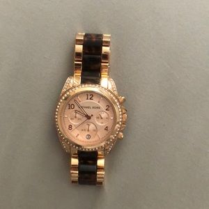 Rose gold and tortoise Michael Kors watch